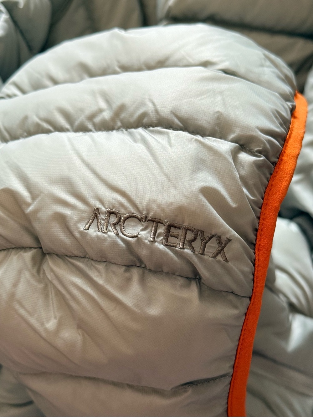 Arc'teryx Light Gray Hooded Down Puffer with Orange Trim - Picture 5 of 9